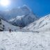 Panorama of snow and mountain Range Landscape with Blue Sky from Annapurna range, Nepal Himalayas.travel concept and camping.